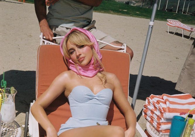 adult female person woman sunbathing face head furniture