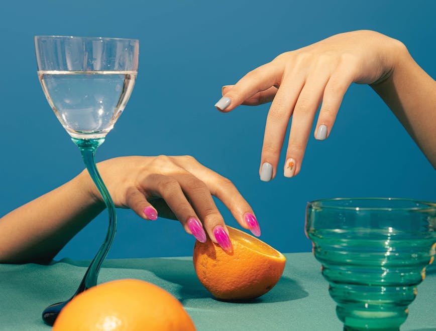 glass goblet finger hand person citrus fruit fruit orange nail grapefruit