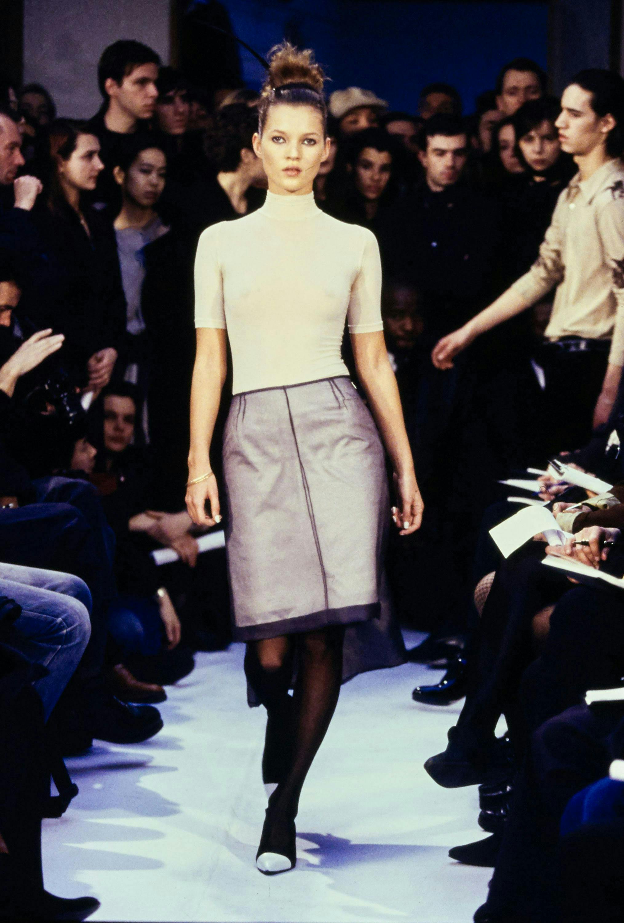 fashion show runway woman paris person human fashion skirt clothing apparel shoe footwear premiere