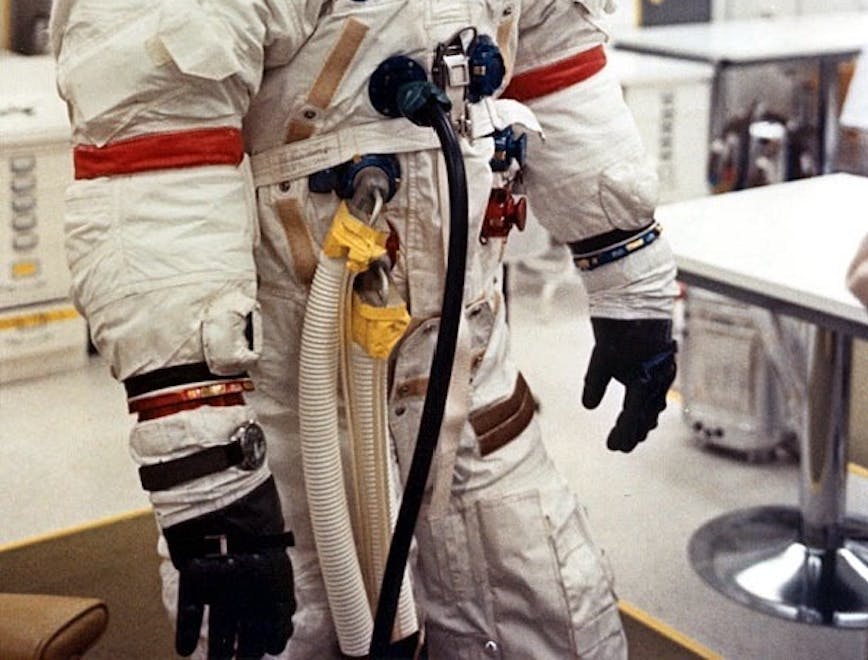 helmet adult male man person clothing glove astronaut