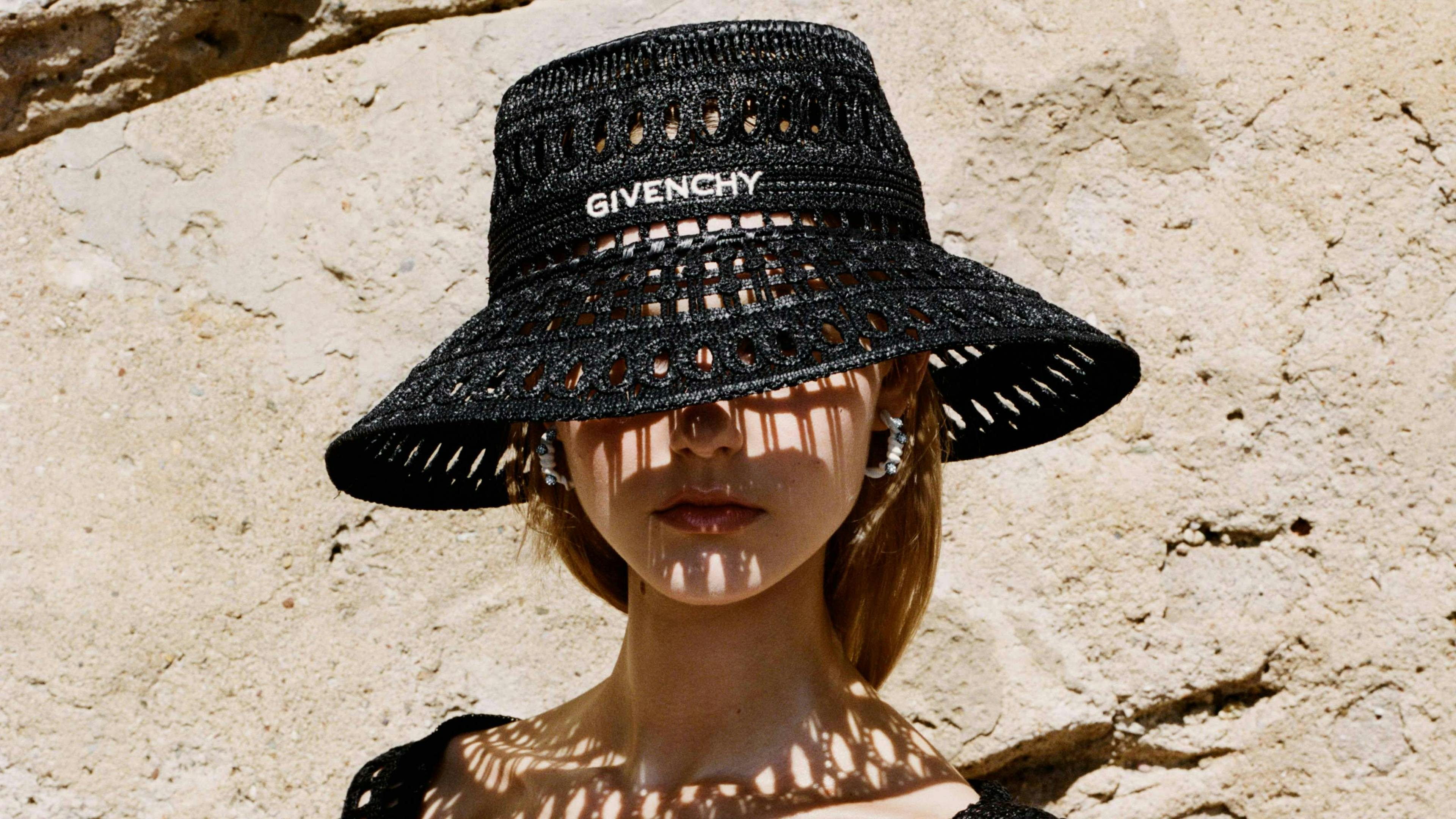 clothing hat sun hat person face head