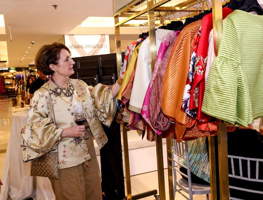 dress formal wear fashion gown boutique handbag person blouse adult woman