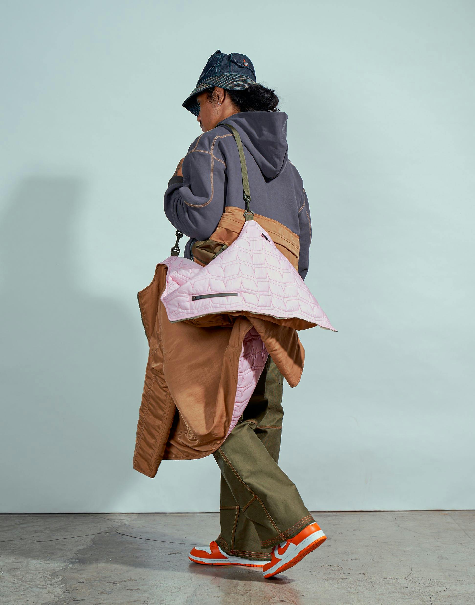 coat bag handbag hat sun hat fashion adult male man person