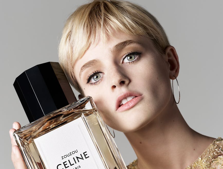 bottle cosmetics perfume face head person